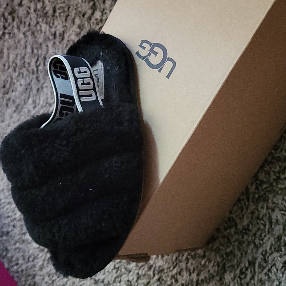 Black UGG furry slides